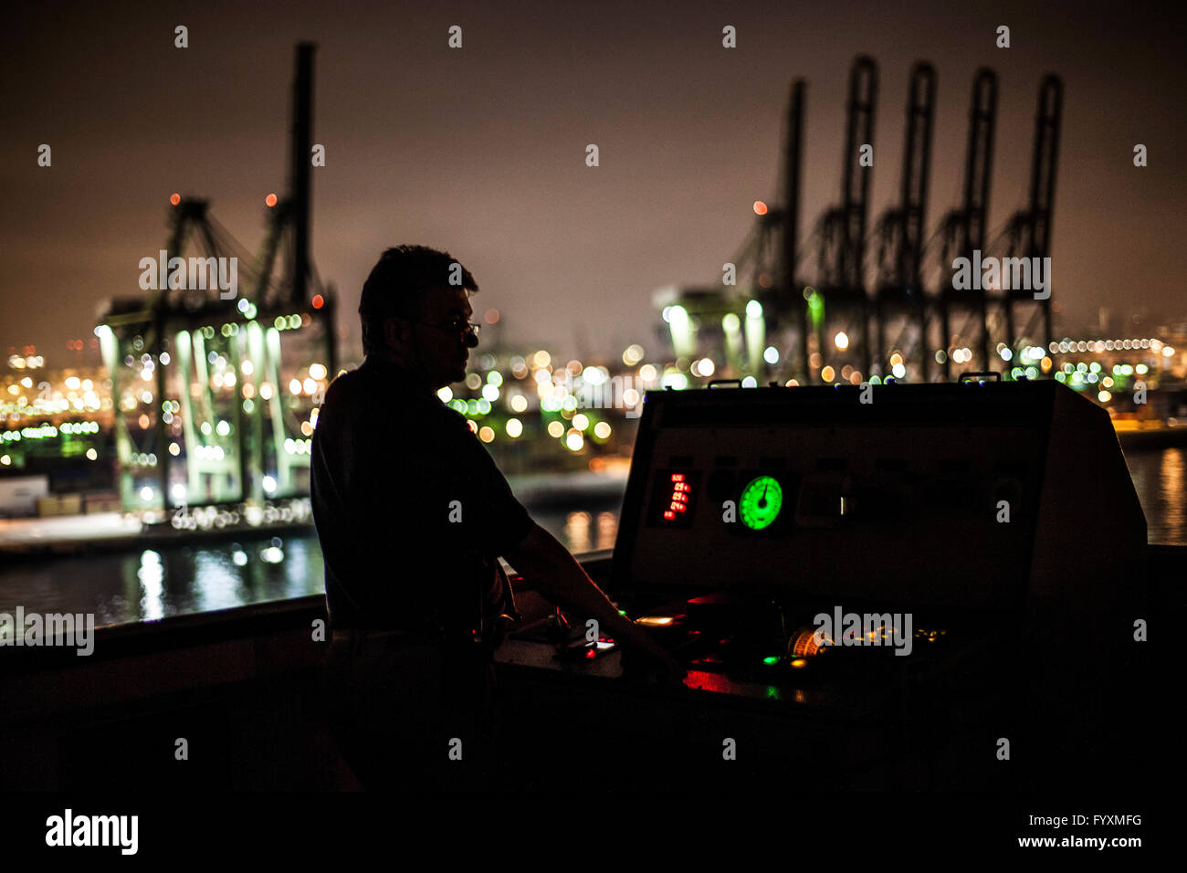Captain of a container ship during the mooring and docking process Stock Photo