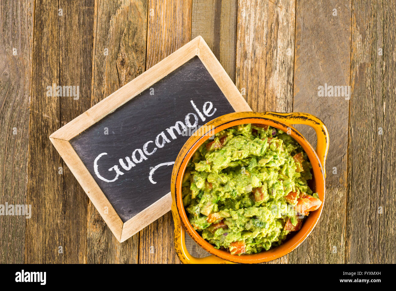 Fresh homemade quacamole in the bowl Stock Photo - Alamy
