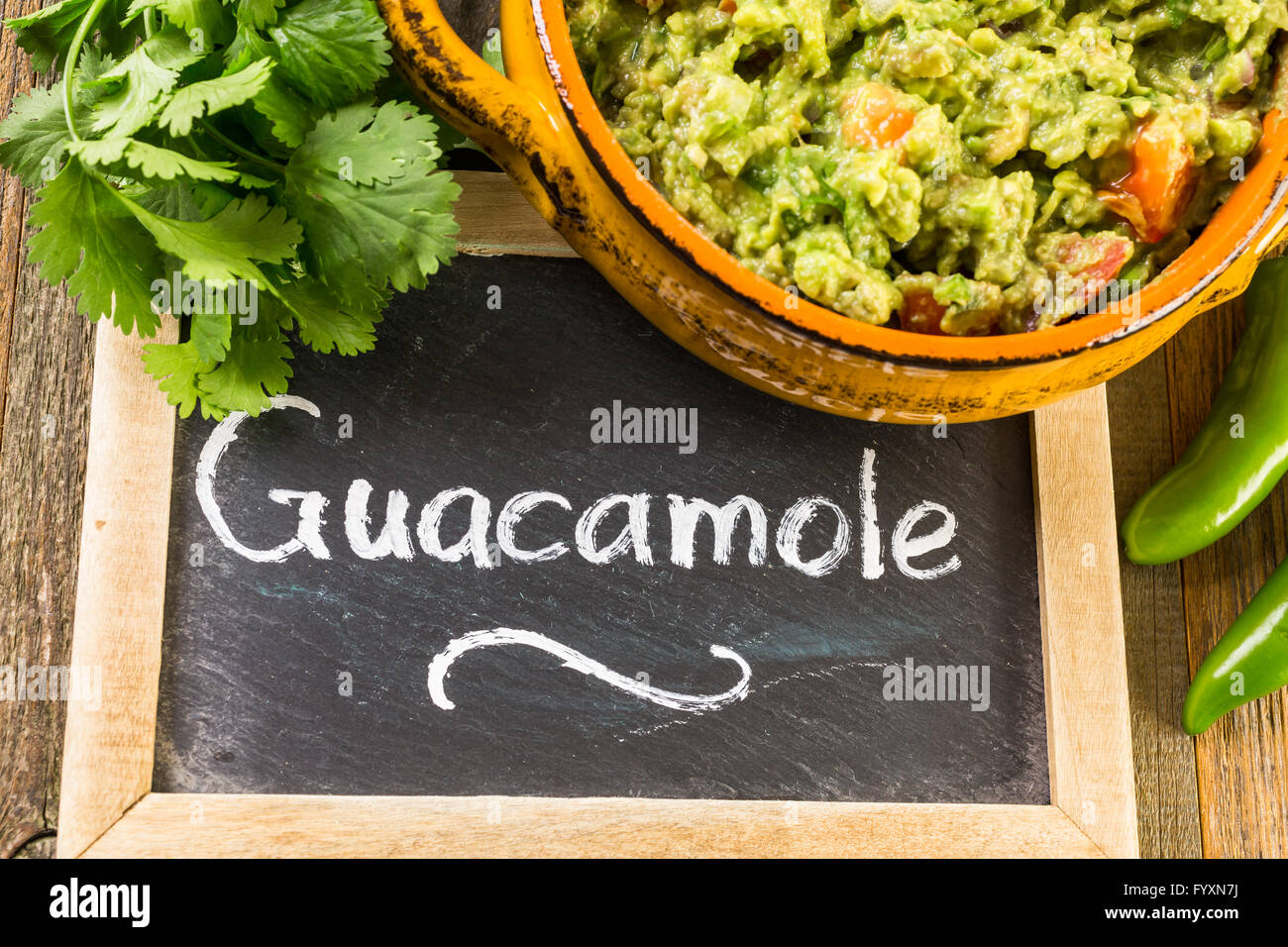 Fresh homemade quacamole in the bowl Stock Photo - Alamy