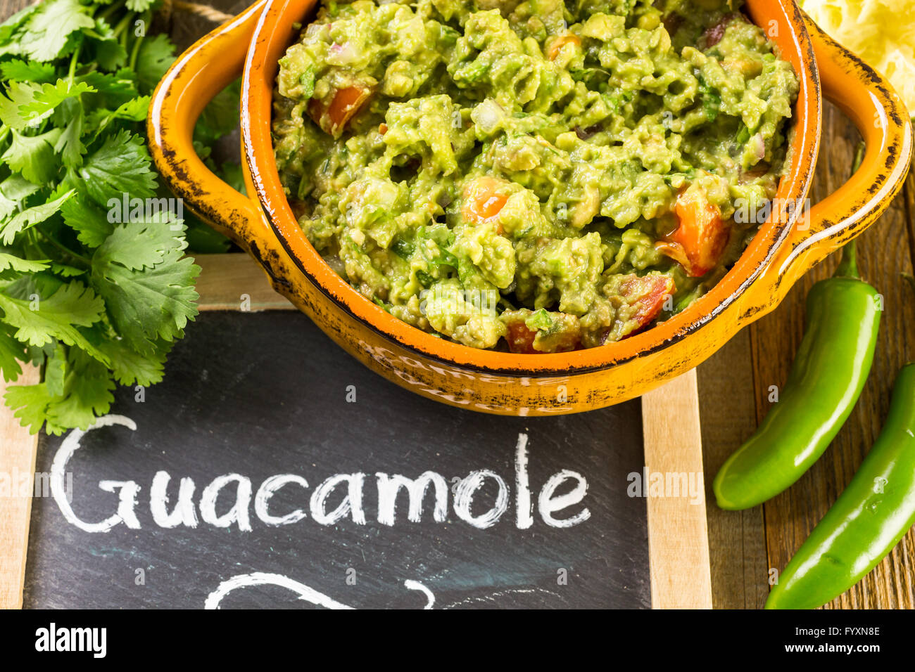 Fresh homemade quacamole in the bowl Stock Photo - Alamy