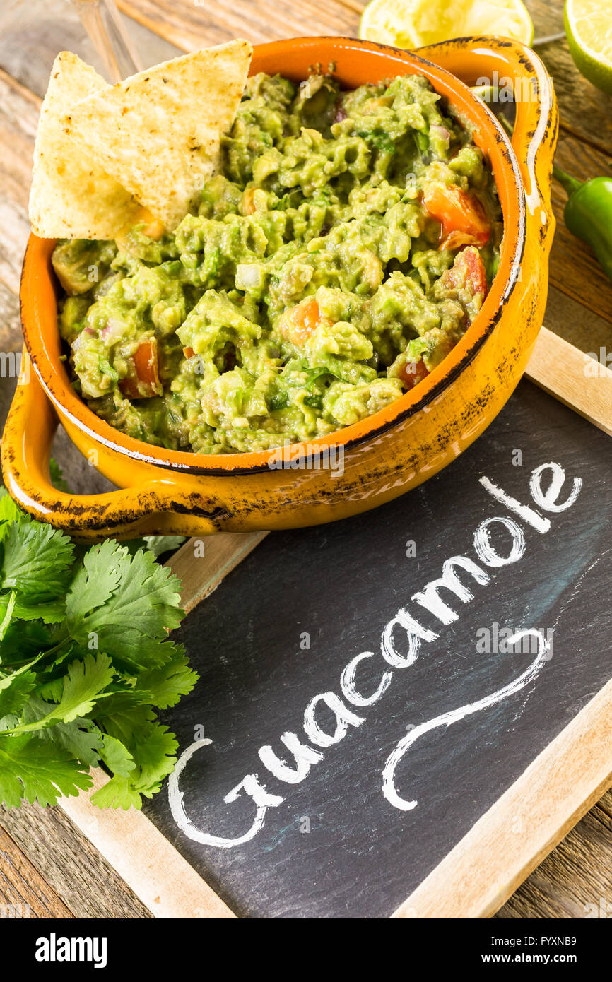Fresh homemade quacamole in the bowl Stock Photo - Alamy
