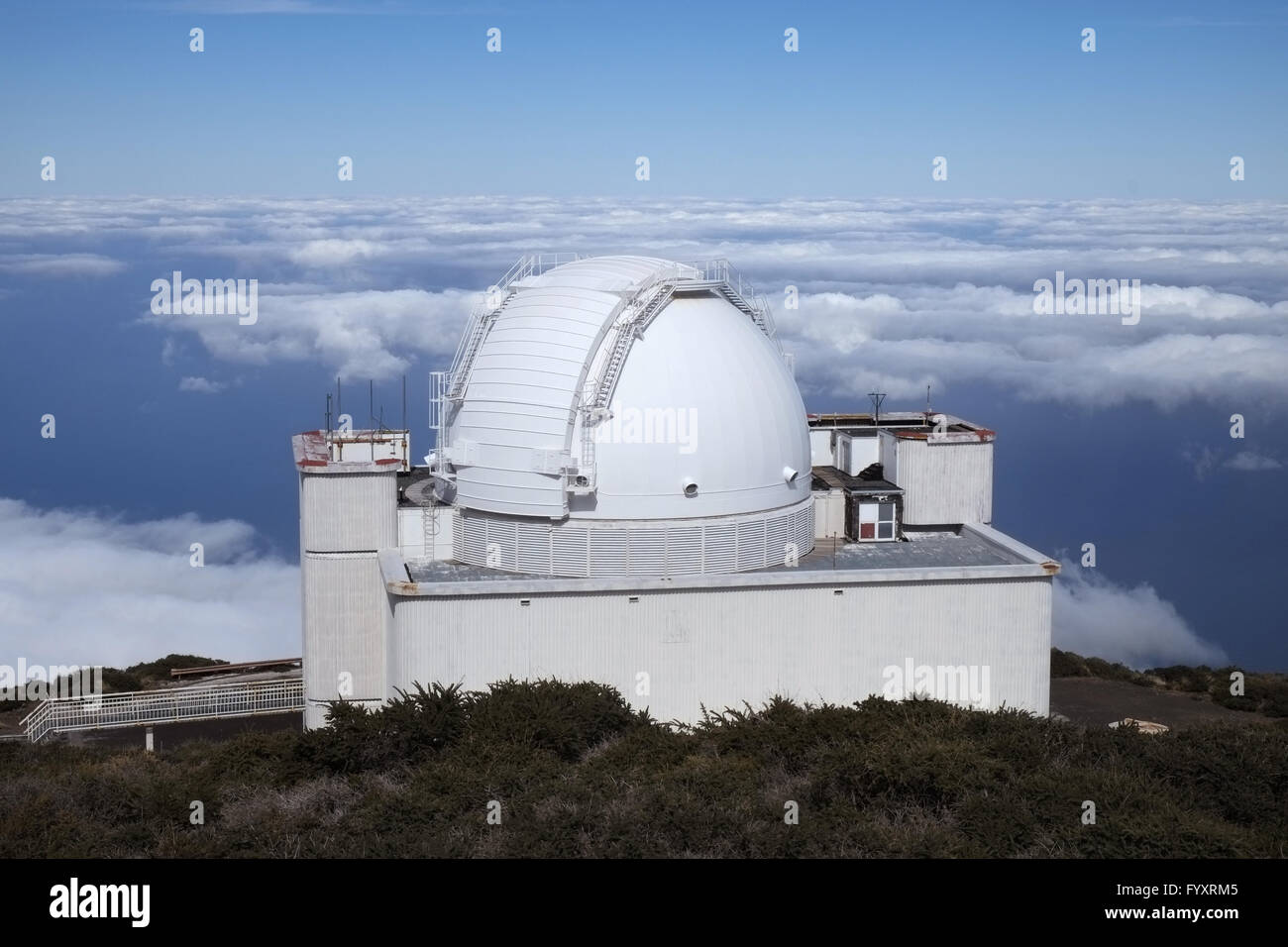 Telescope on the crater rim Stock Photo