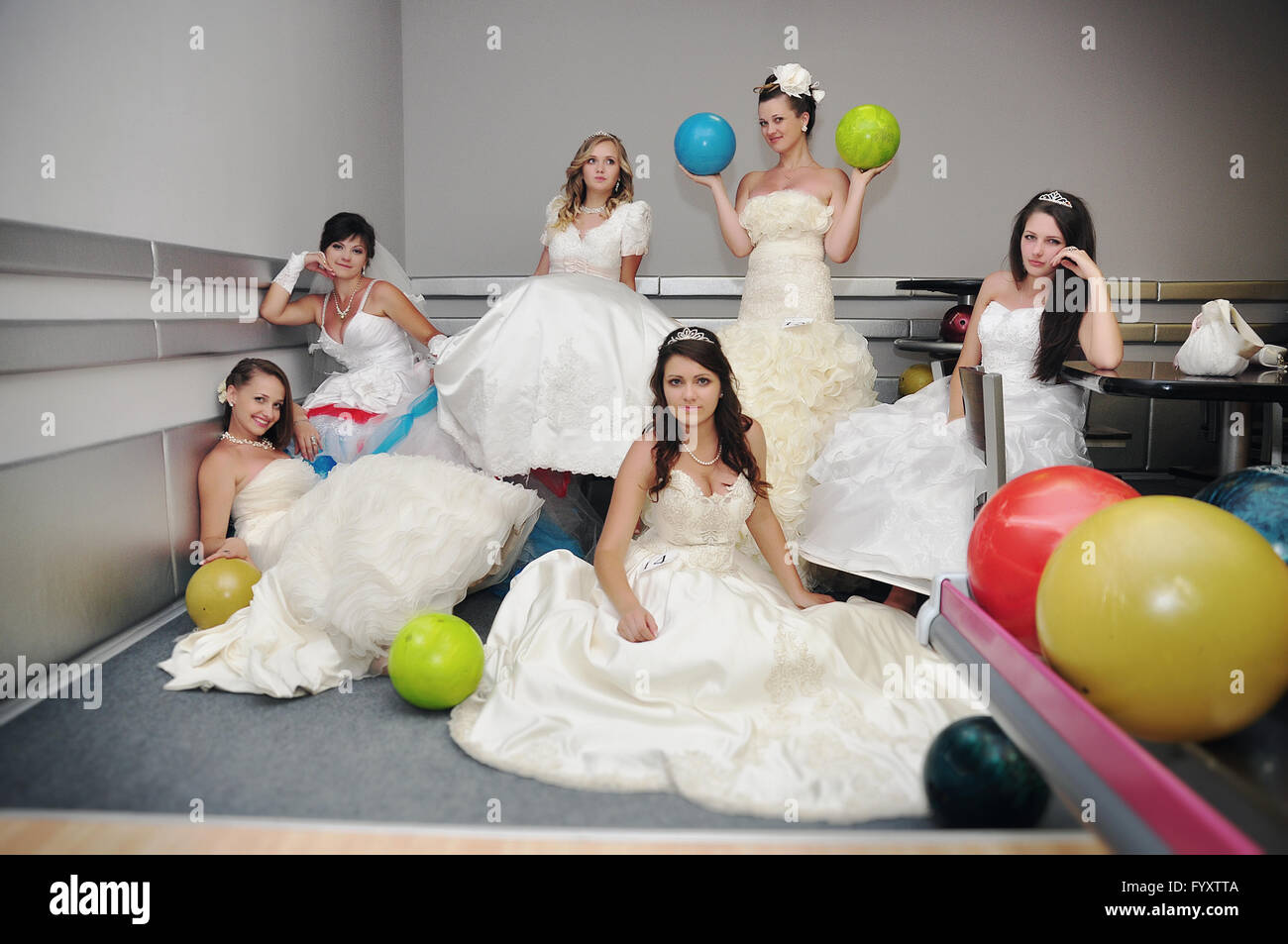 funny brides  on the bowling club Stock Photo