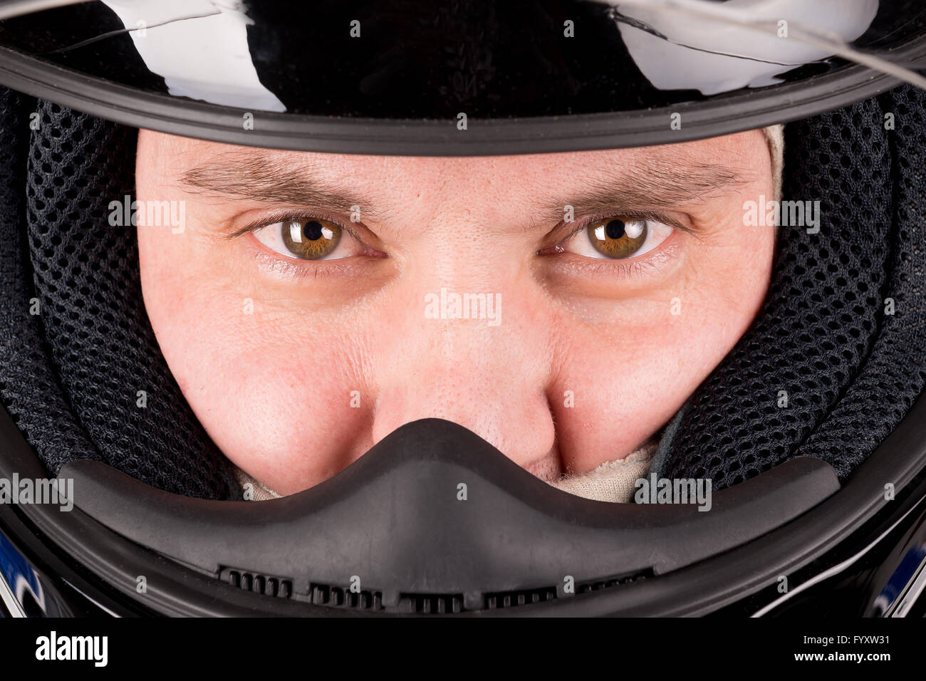 Racing driver close up posing with helmet Stock Photo