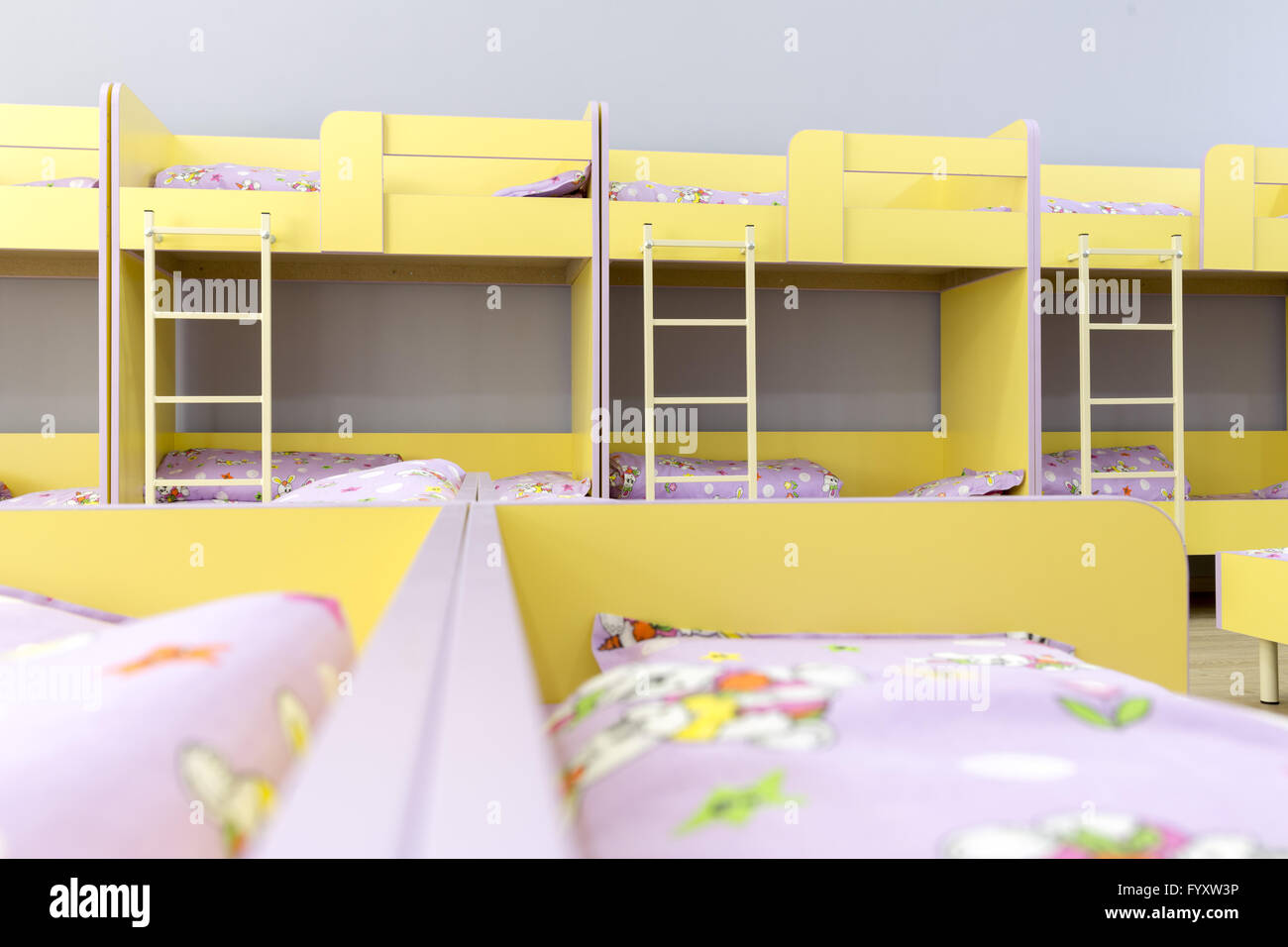 Modern kindergarten bedroom with small beds Stock Photo Alamy