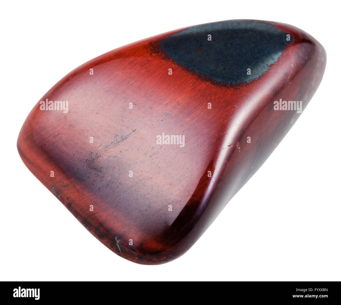 macro shooting of natural mineral stone - polished red ox eye gemstone isolated on white background Stock Photo