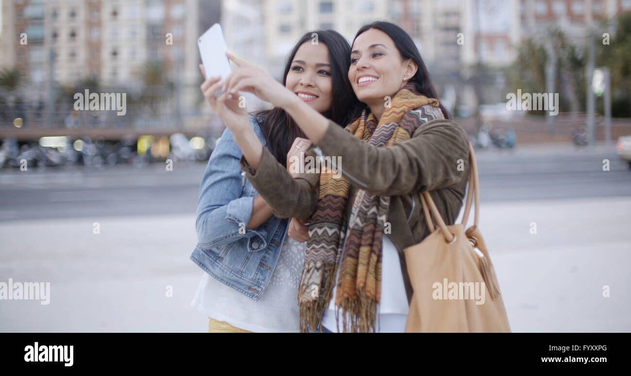 Two women posing photo hi-res stock photography and images - Alamy