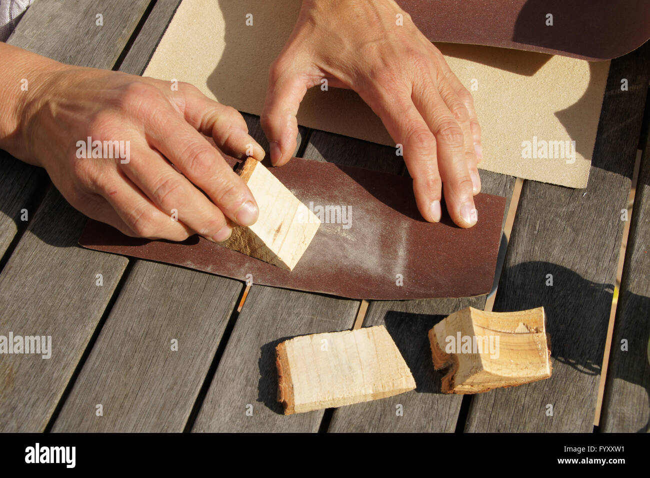 Grinding cedarwood pieces Stock Photo Alamy