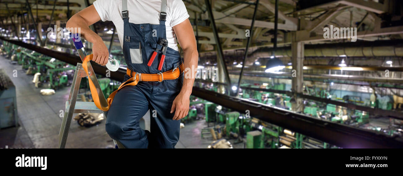 Worker with instruments Stock Photo - Alamy