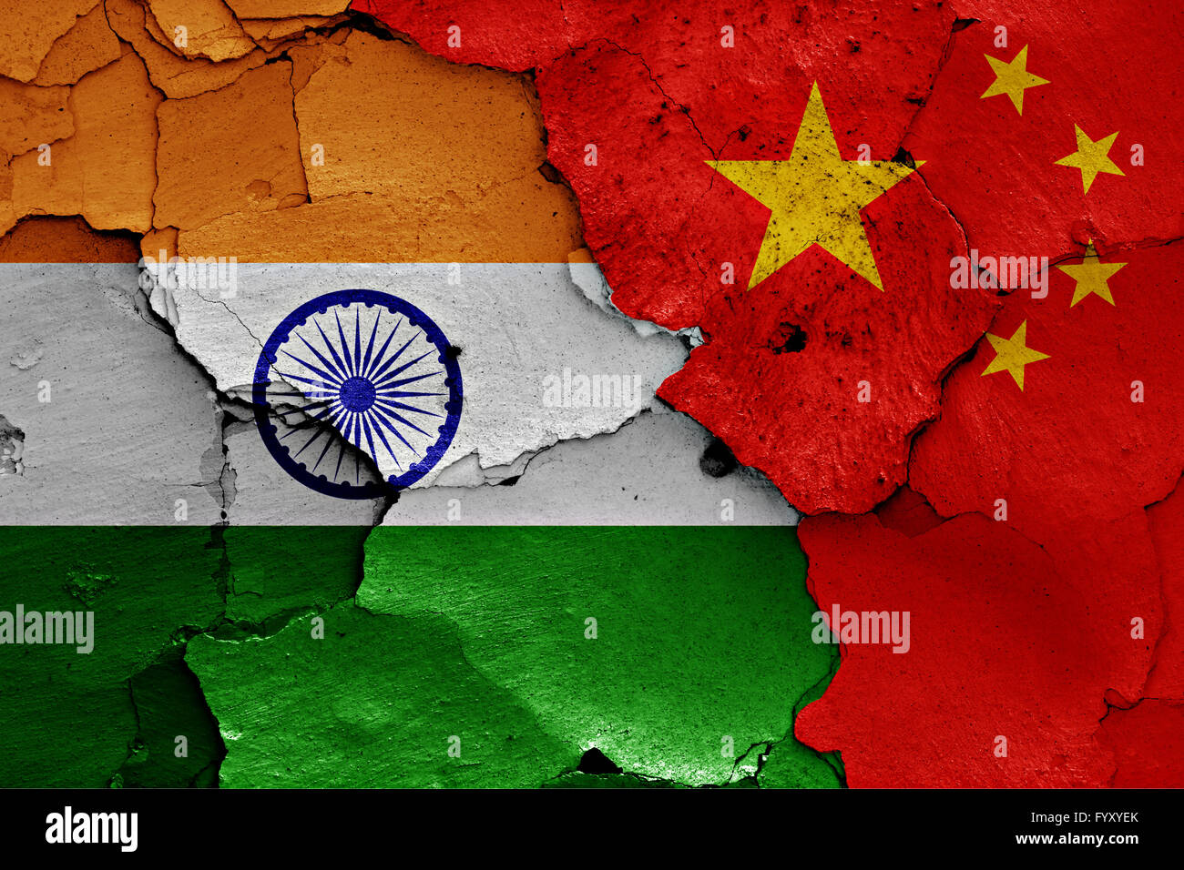 flags of India and China painted on cracked wall Stock Photo