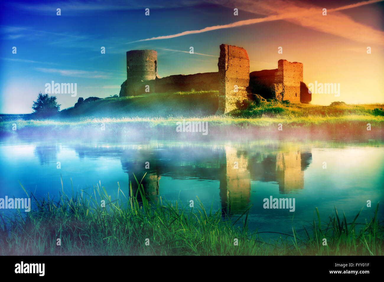 Old castle ruins at magical sunset Stock Photo