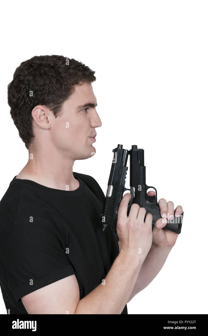 Man holding a pistol Stock Photo