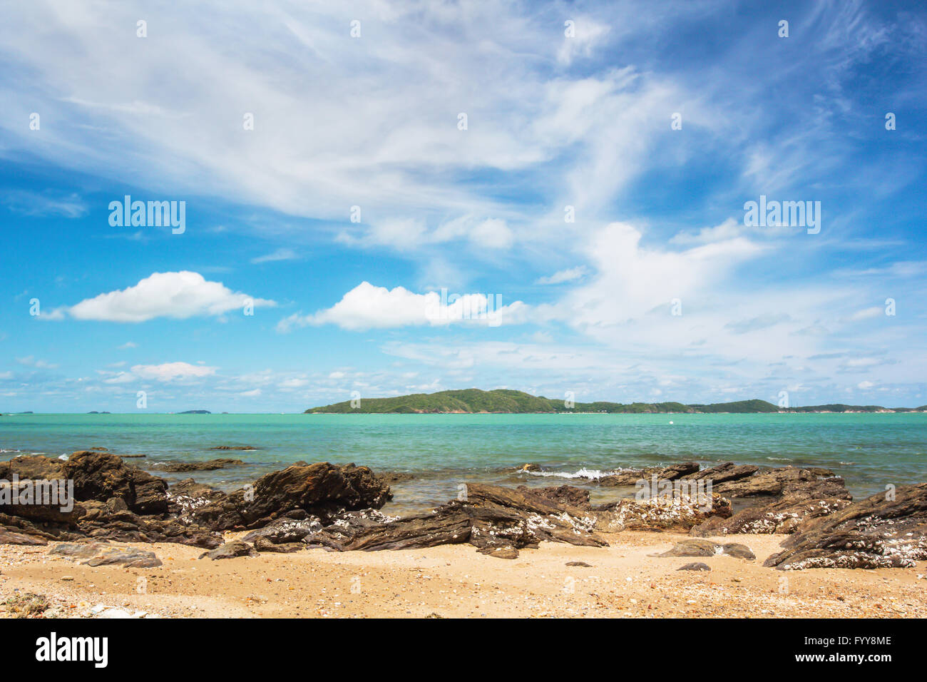 Landscape sand and rock beach on the sea and blue sky Stock Photo - Alamy