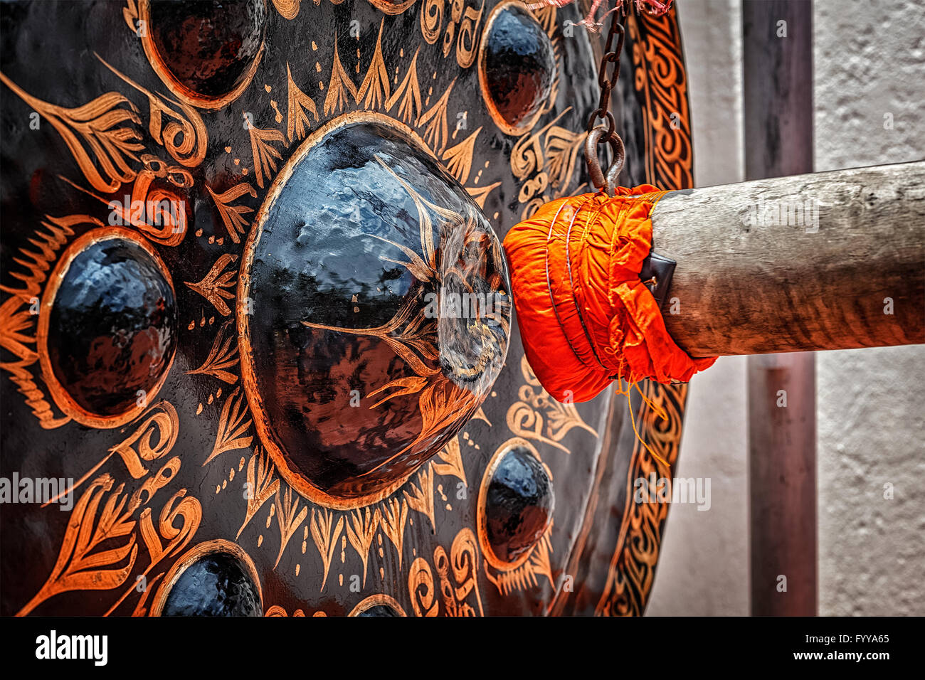 Mallet beating gong in Buddhist temple Stock Photo Alamy