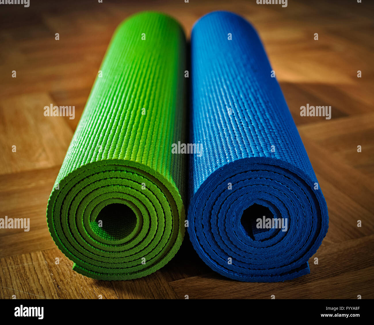 Yoga mat on floor Stock Photo