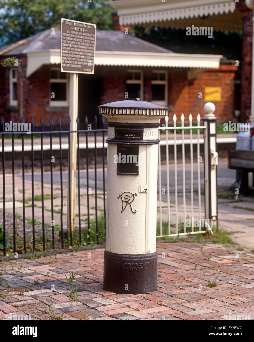White postbox, outside. Stock Photo