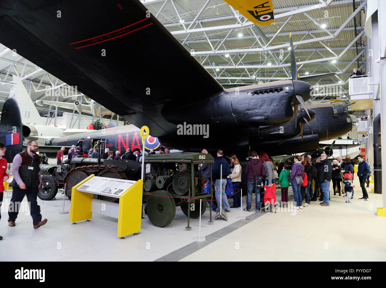 People queuing to get into the Lancaster bomber at Duxfod Air Museum, England Stock Photo