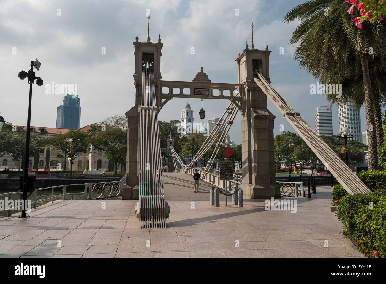 Cavenagh Bridge Spanning the Singapore River near the Fullerton Hotel, Singapore Stock Photo