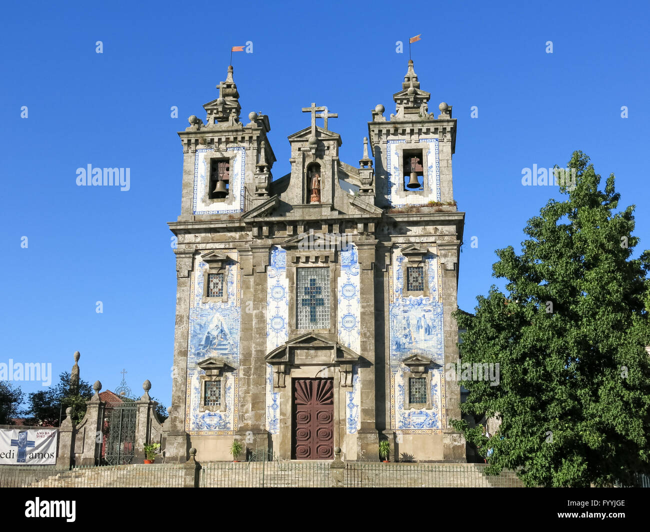 Facade of Church of Saint Ildefonso with azulejos tile work on Batalha Square in Porto, Portugal Stock Photo