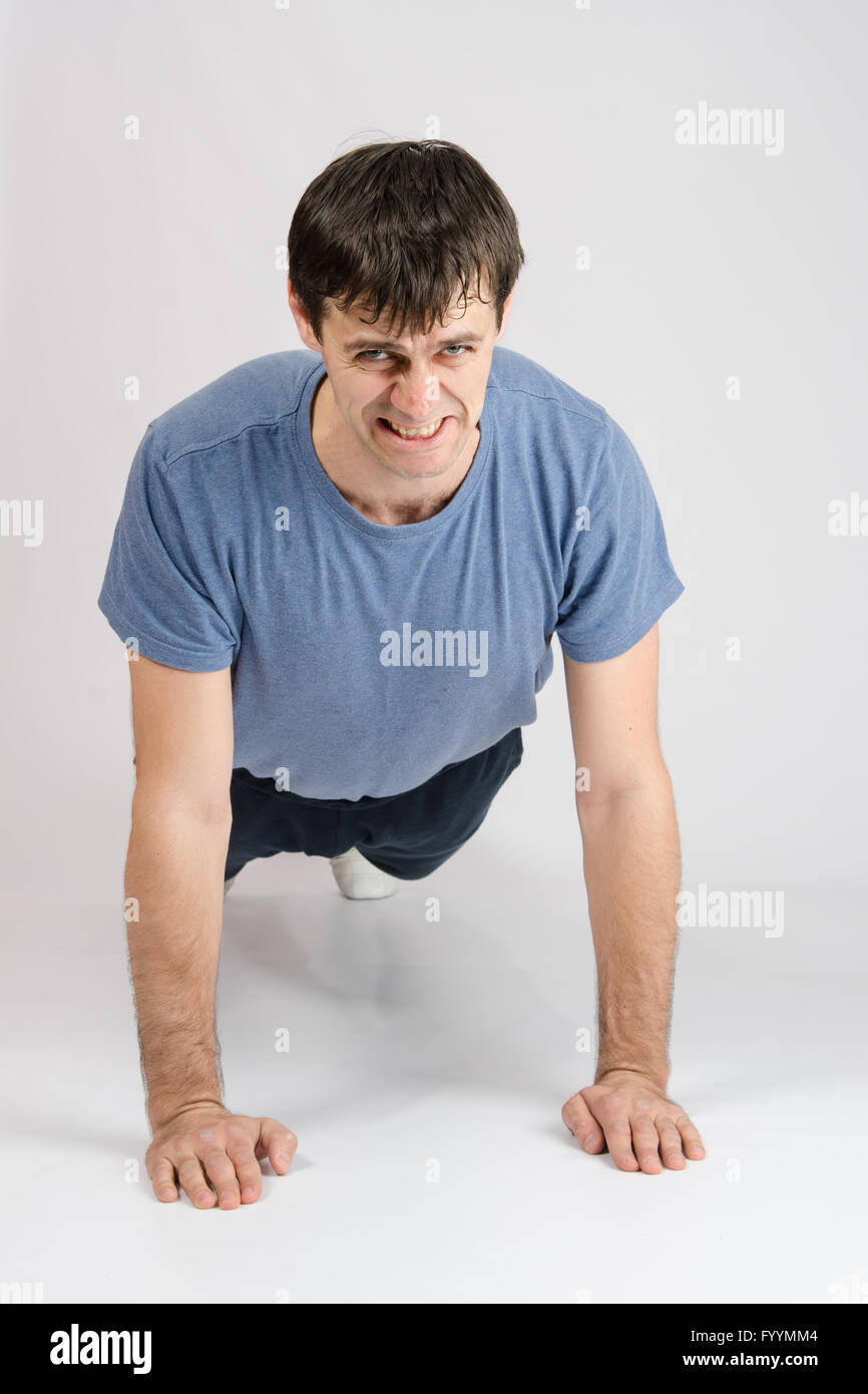 Tired Rung Tired sportsman wrung from the floor Stock Photo - Alamy