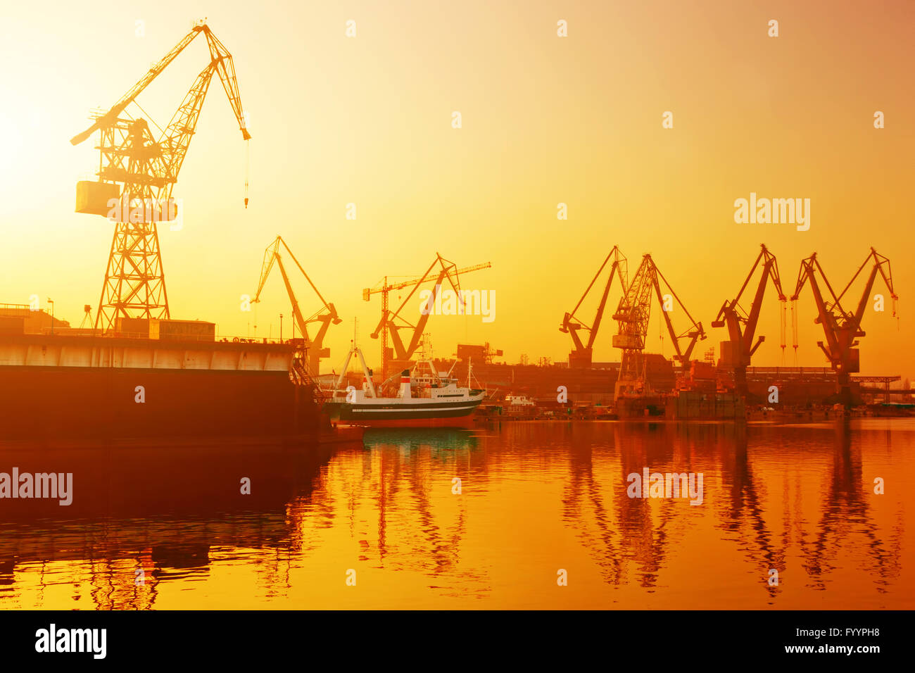 Cranes in historical shipyard in Gdansk Stock Photo