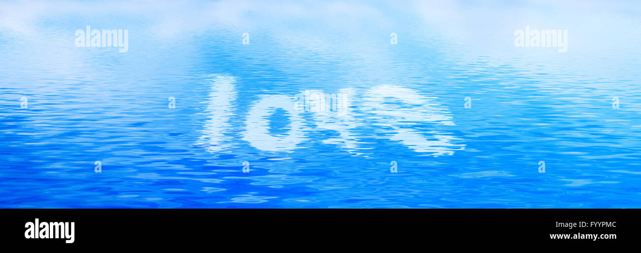 Love text in clean water Stock Photo