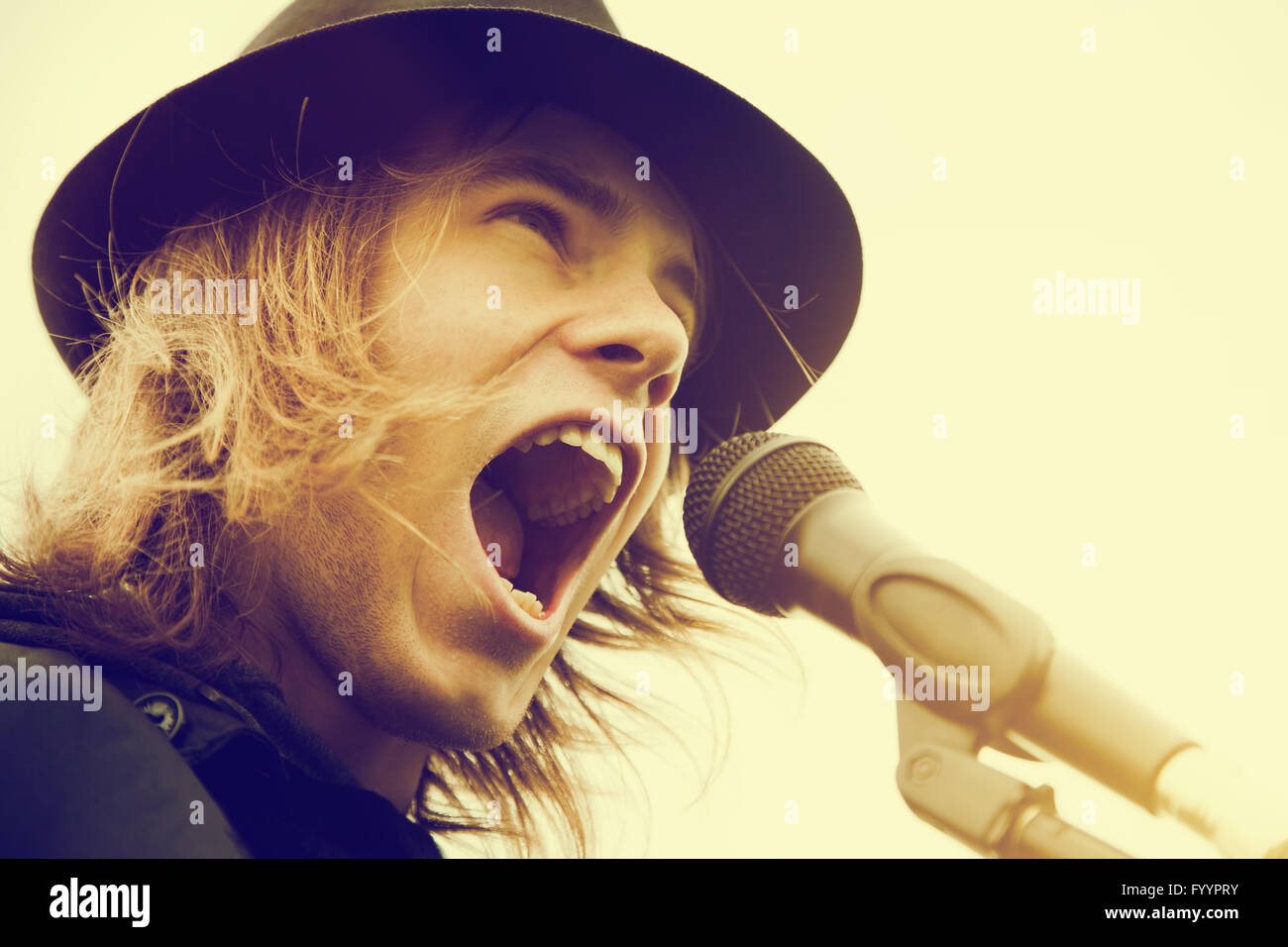 Man singer long hair hi-res stock photography and images - Alamy