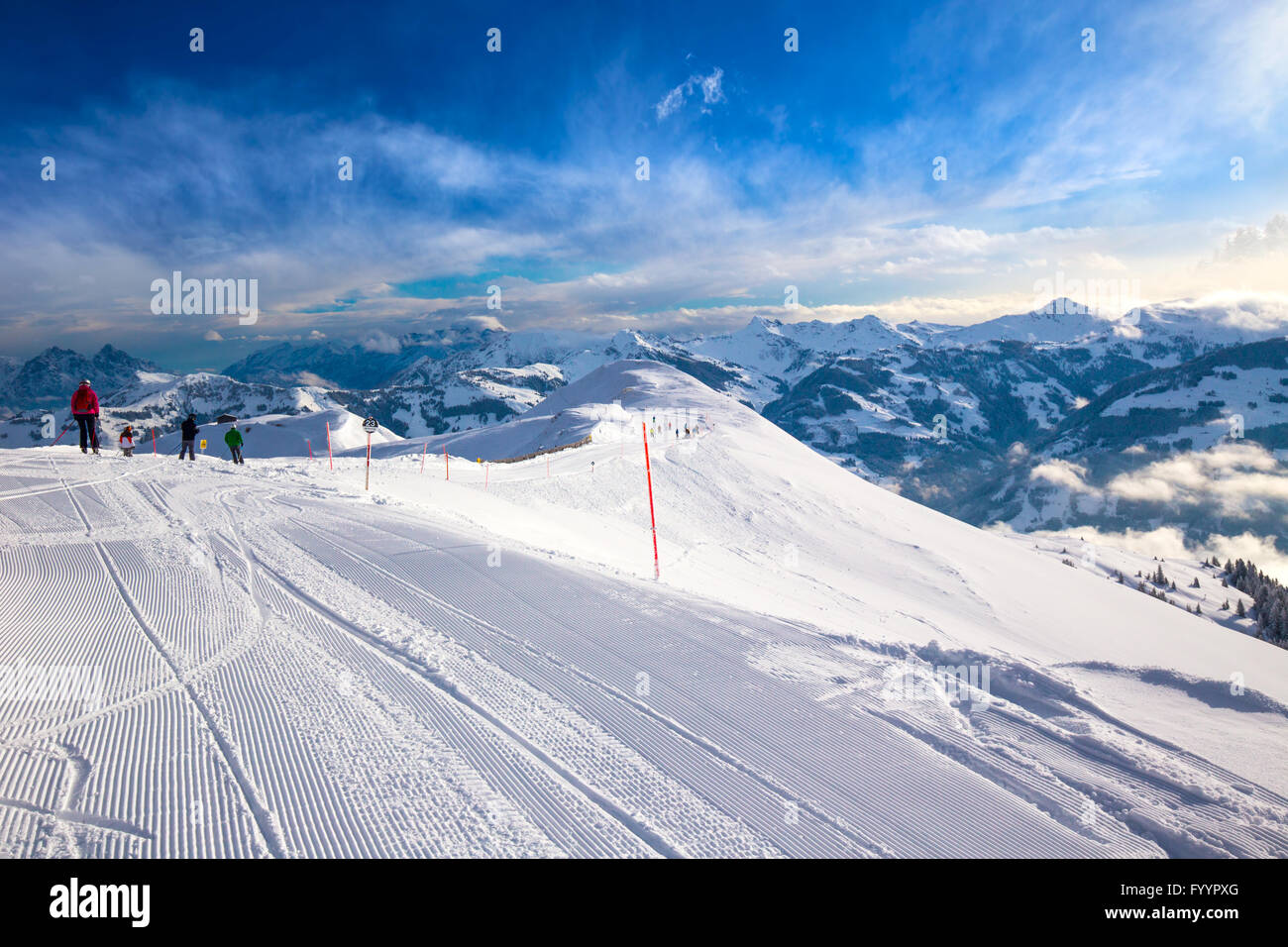 KITZBUEHEL, AUSTRIA - February 17, 2016 - Skiers skiing in Steinbergkogel - Kitzbuehel ski resort with 54 cable cars, 170 km pre Stock Photo
