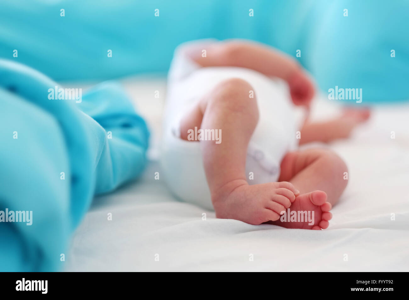 Two weeks old newborn baby's legs and bottom Stock Photo Alamy