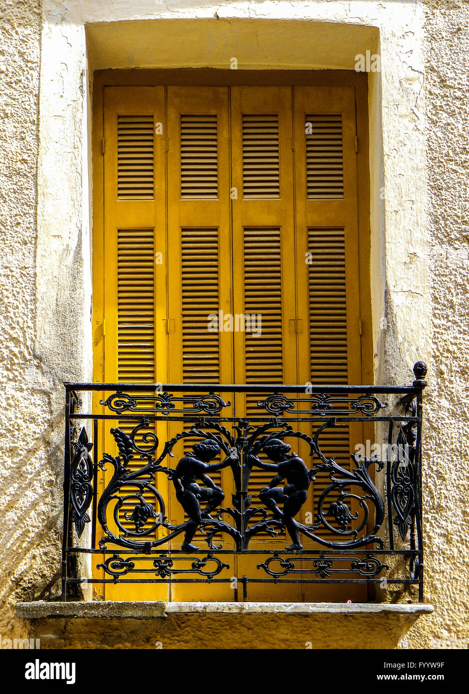 Yellow traditional window in Greece, Europe Stock Photo