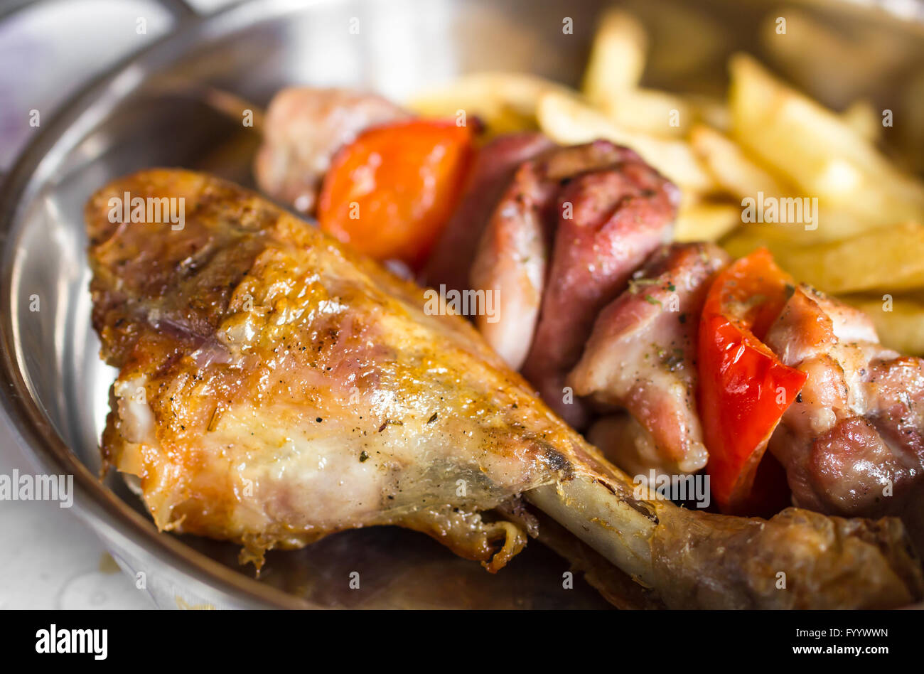 Grilled meat with french fries Stock Photo Alamy