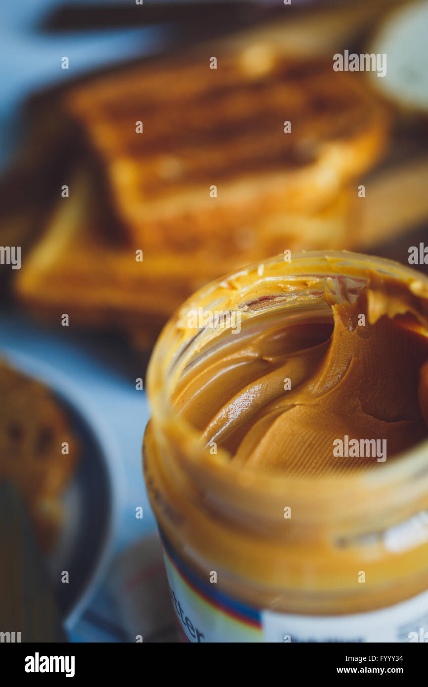 Open jar of peanut butter Stock Photo Alamy