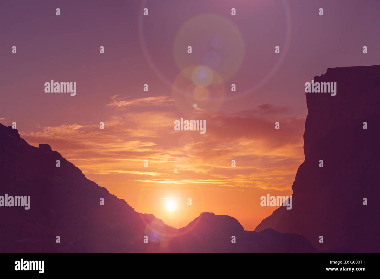 Mountains on sunset Stock Photo - Alamy