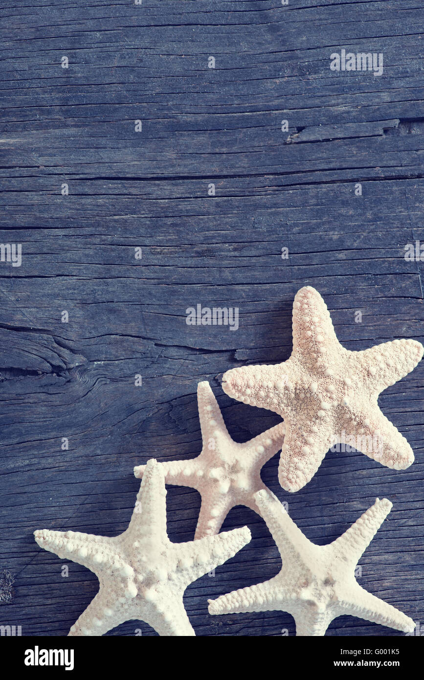 starfish on wooden background, sea shell on a table Stock Photo - Alamy