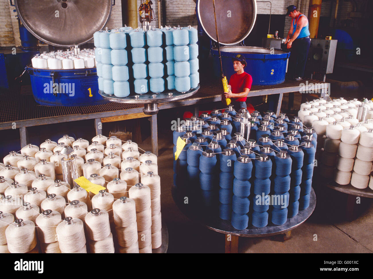 Male plant worker at Globe Dye Works, Philadelphia, PA, bleaching & dyeing of yarns Stock Photo