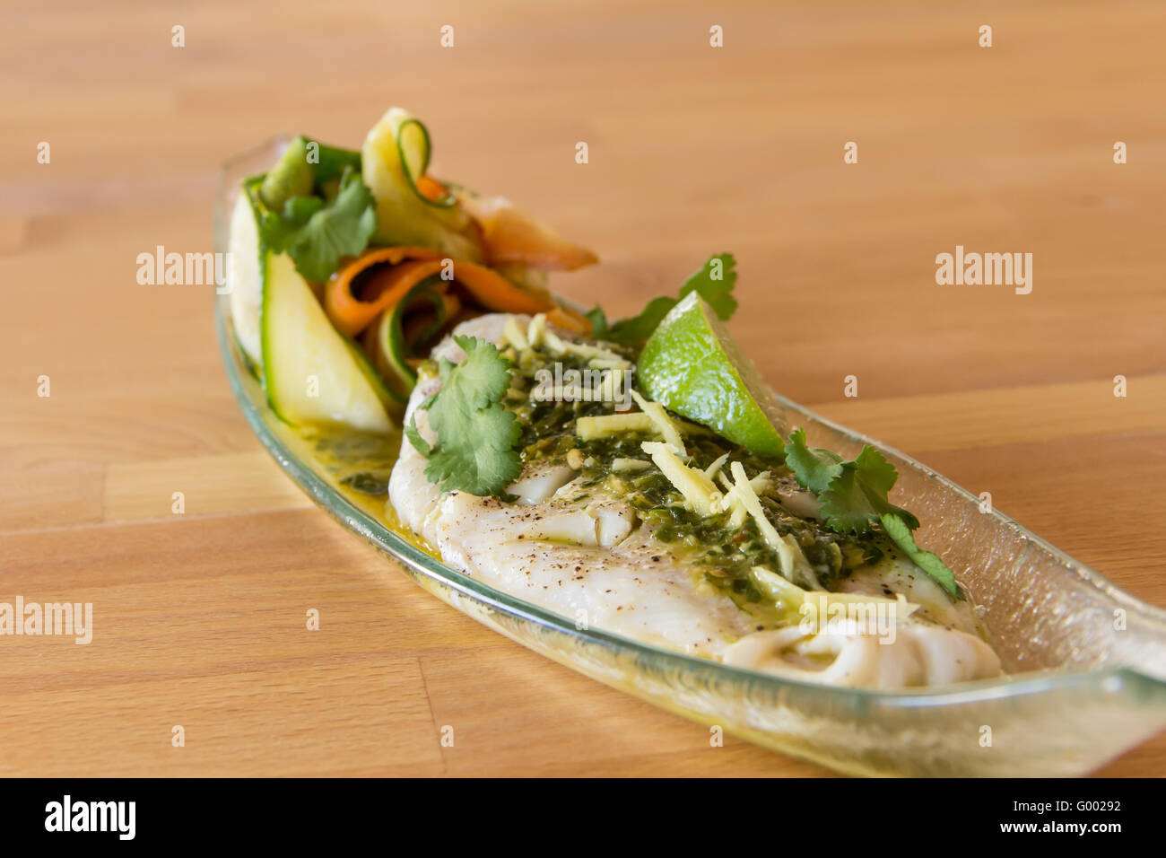 Fish filet seasoned with ginger Stock Photo