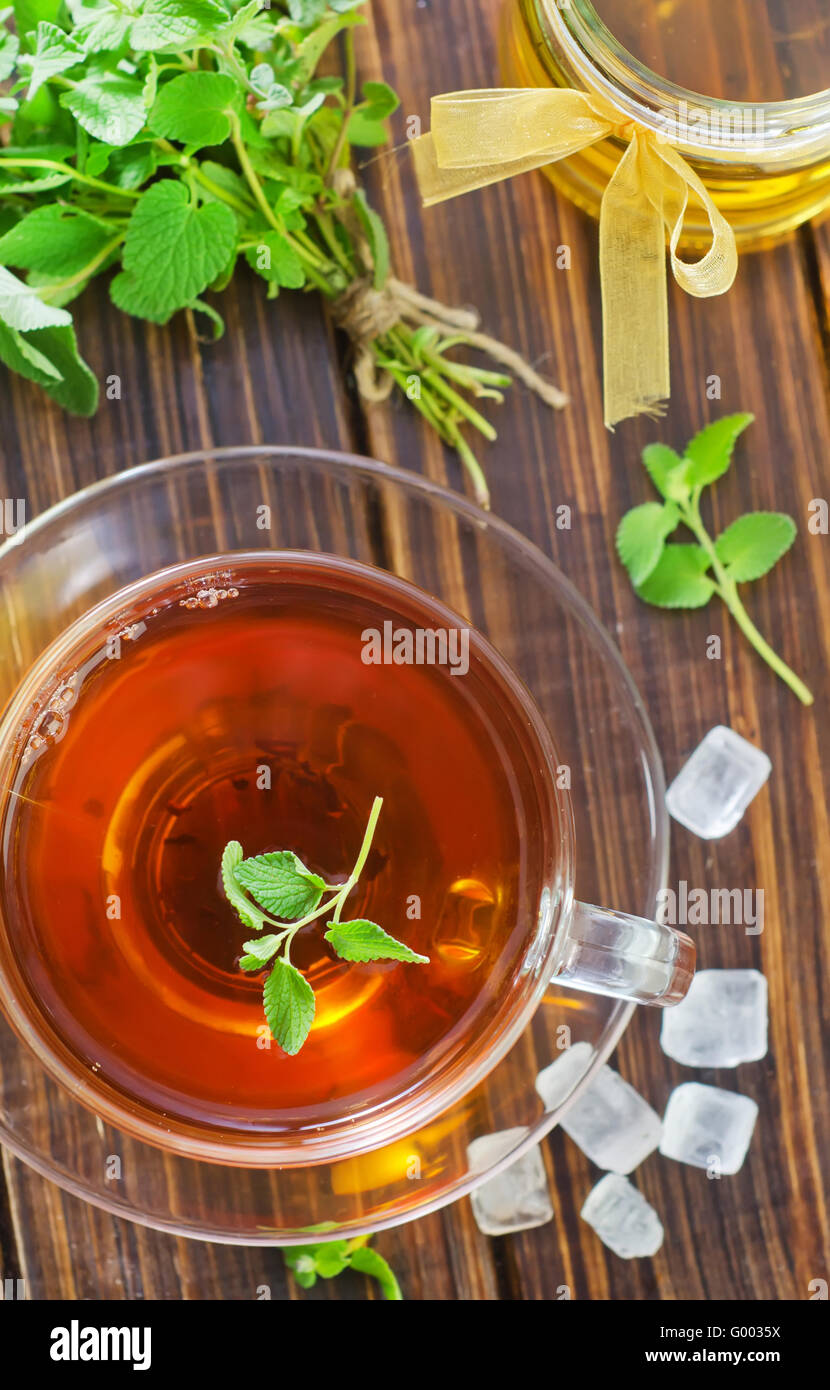 Tea with mint and honey Stock Photo Alamy