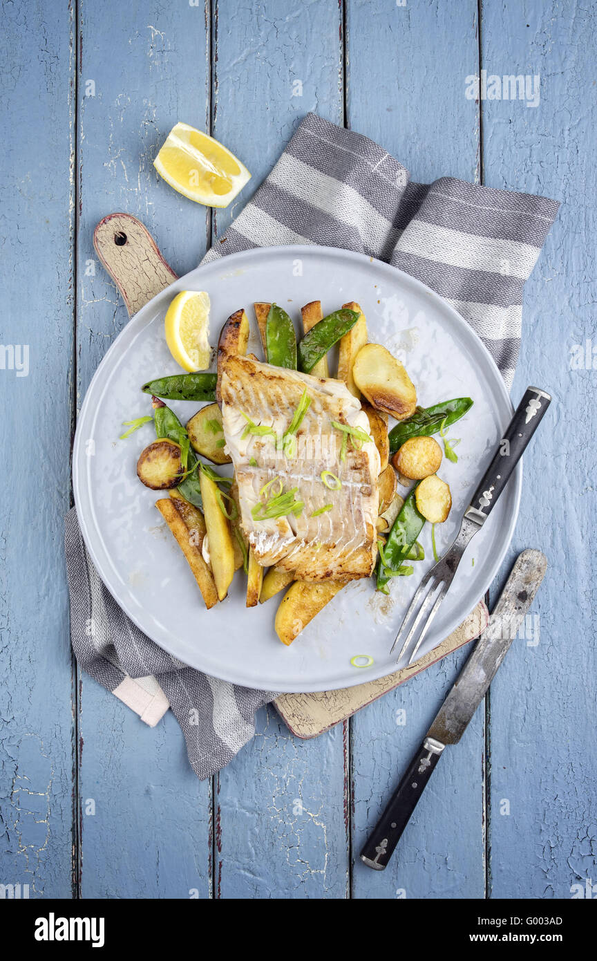 Codfisch Filet with Vegetable Stock Photo