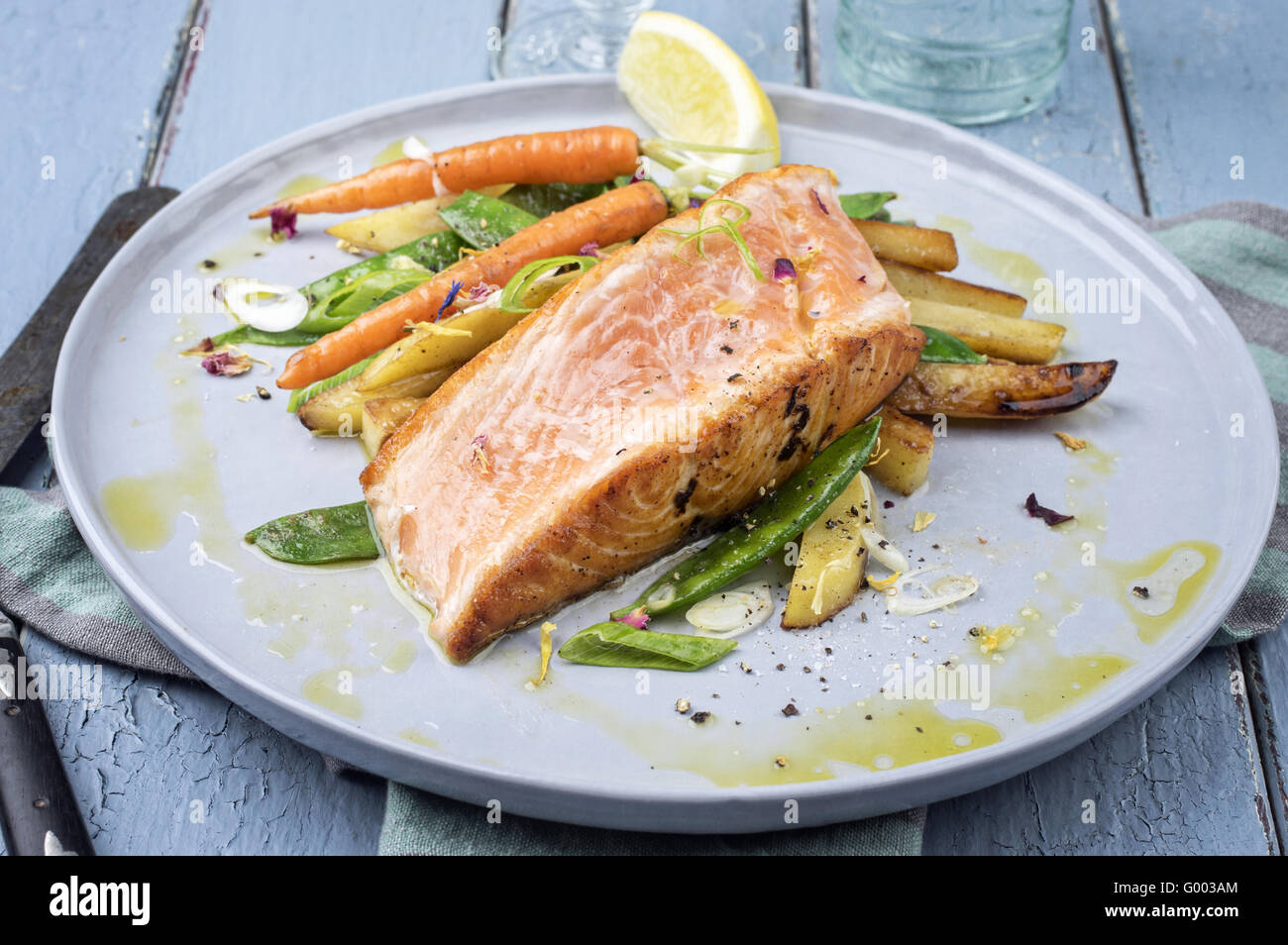 Salmon Filet with Vegetable Stock Photo - Alamy