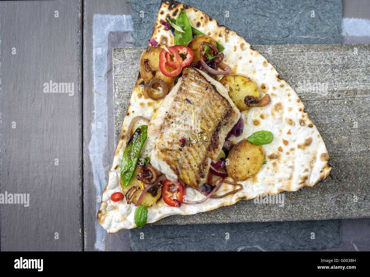 Codfish Filet with Vegetable on Yufka Bread Stock Photo