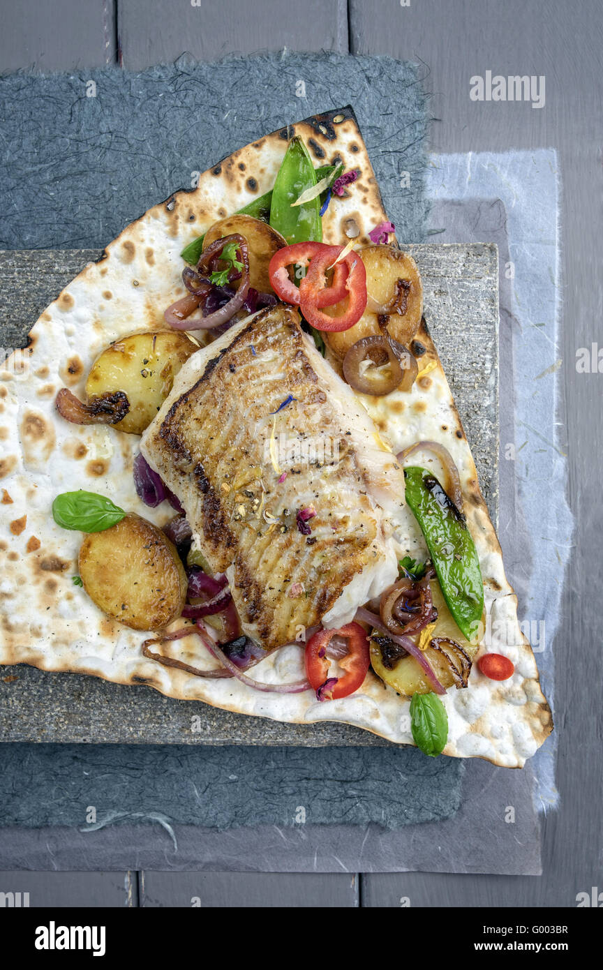 Codfish Filet with Vegetable on Yufka Bread Stock Photo