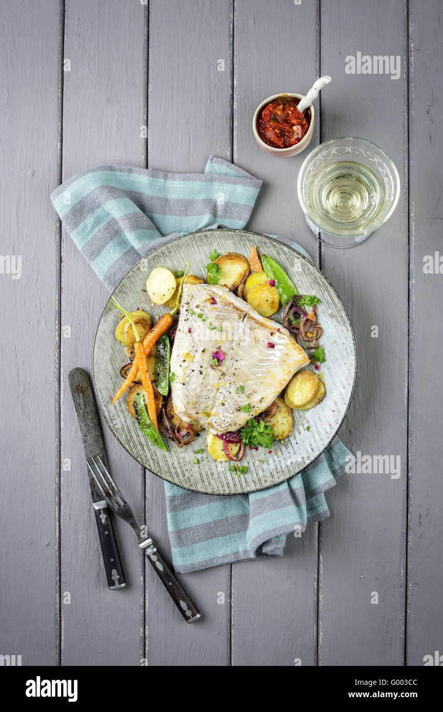 Codfish Filet with Vegetable Stock Photo