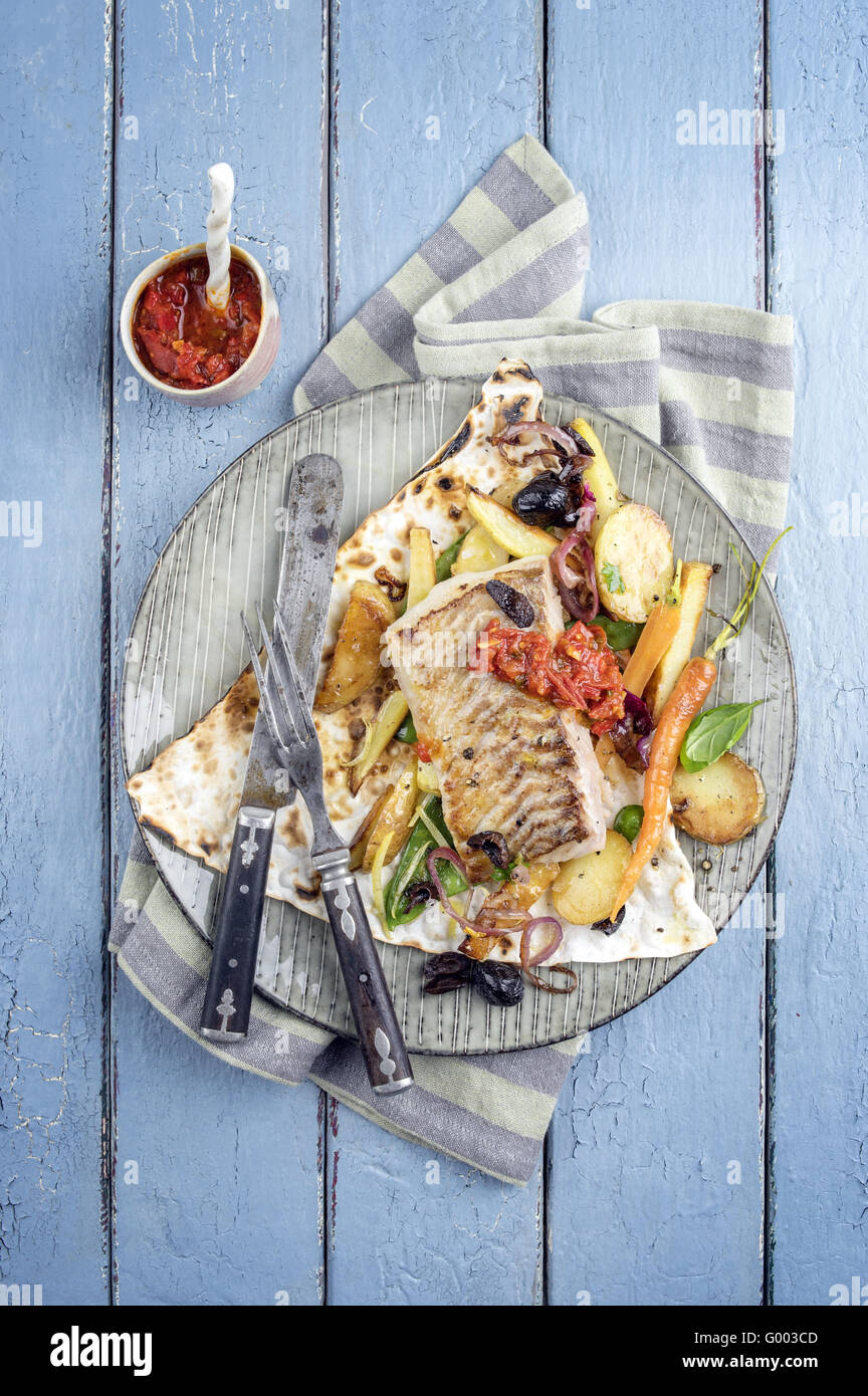 Codfish Filet with Vegetable Stock Photo