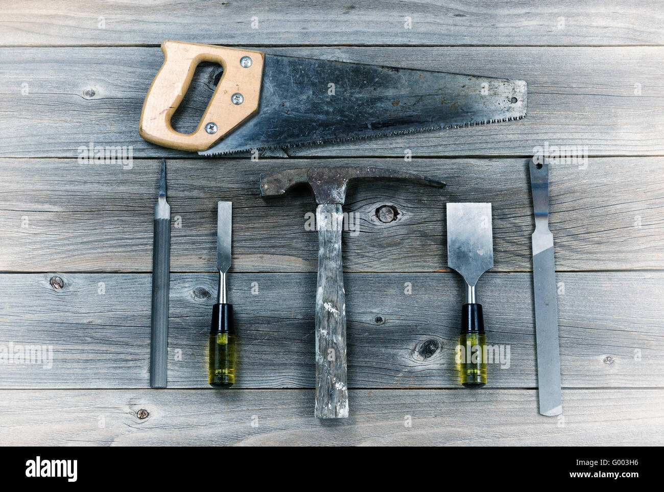 Vintage Hand Tools on Rustic Wooden Boards Stock Photo