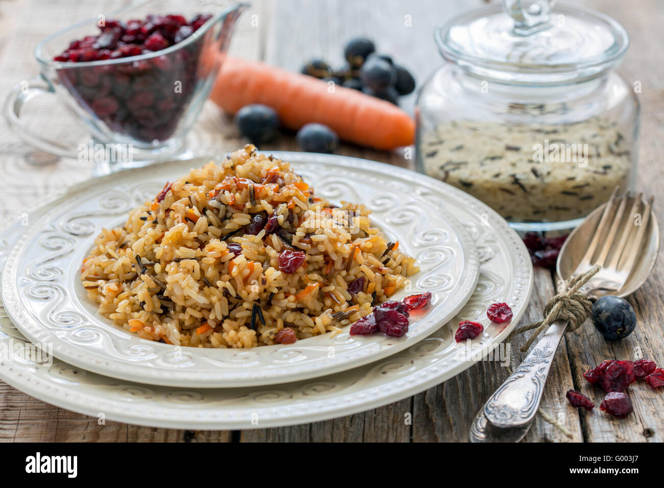 Pilaf with raisins, carrots and cranberries Stock Photo Alamy