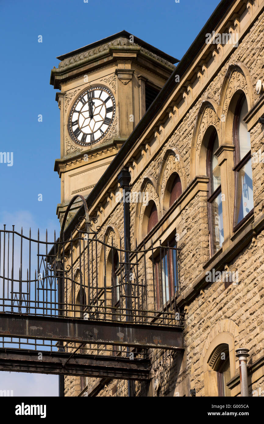UK, England, Yorkshire, Calderdale, Hebden Bridge, former Co-operative hall clock tower and footbridge over Carlton Street Stock Photo