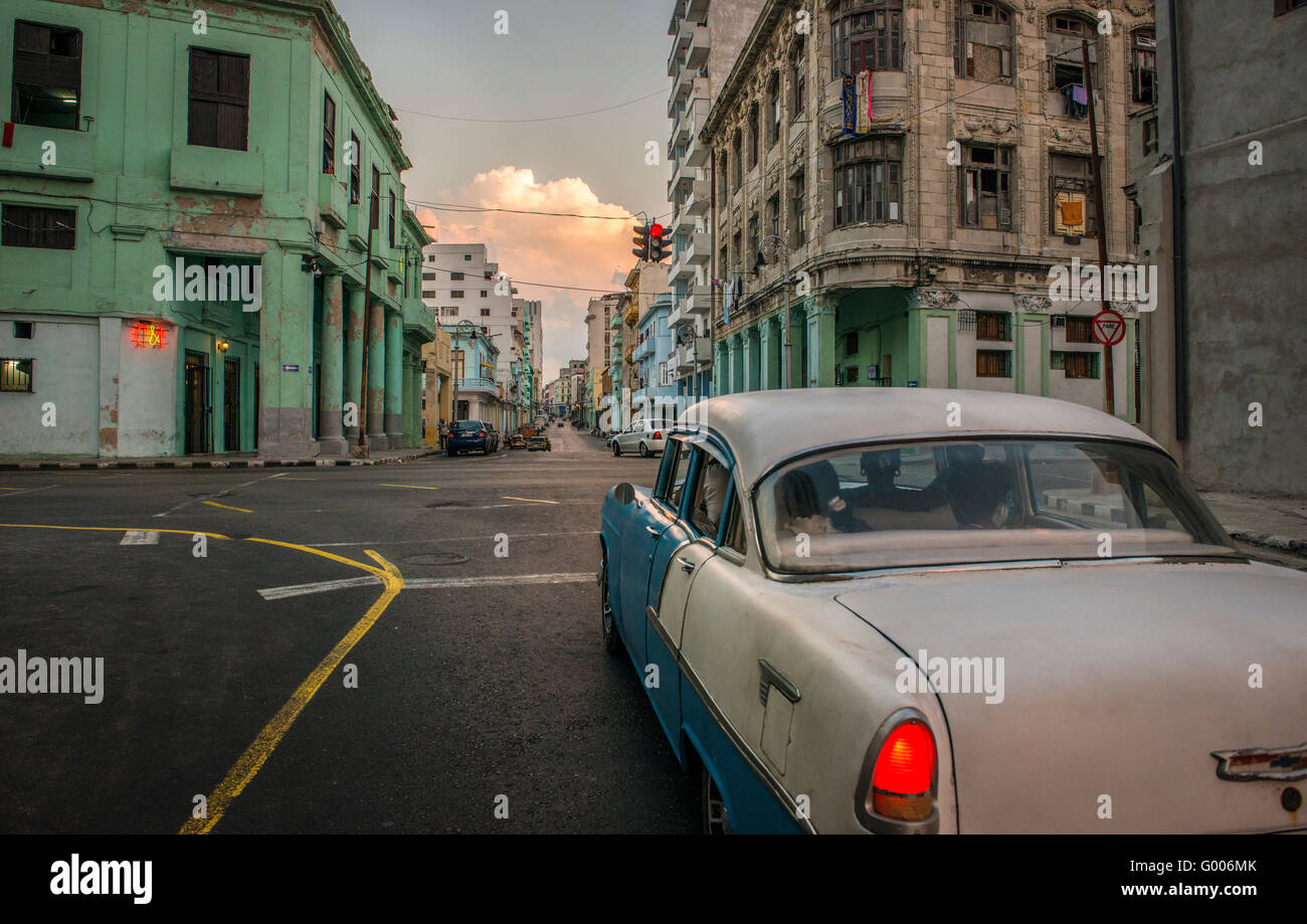 A vintage 50's Chevy waits at the traffic light light at the intersection of Galiano and San Lazaro in Centro Habana, La Habana, Cuba Stock Photo