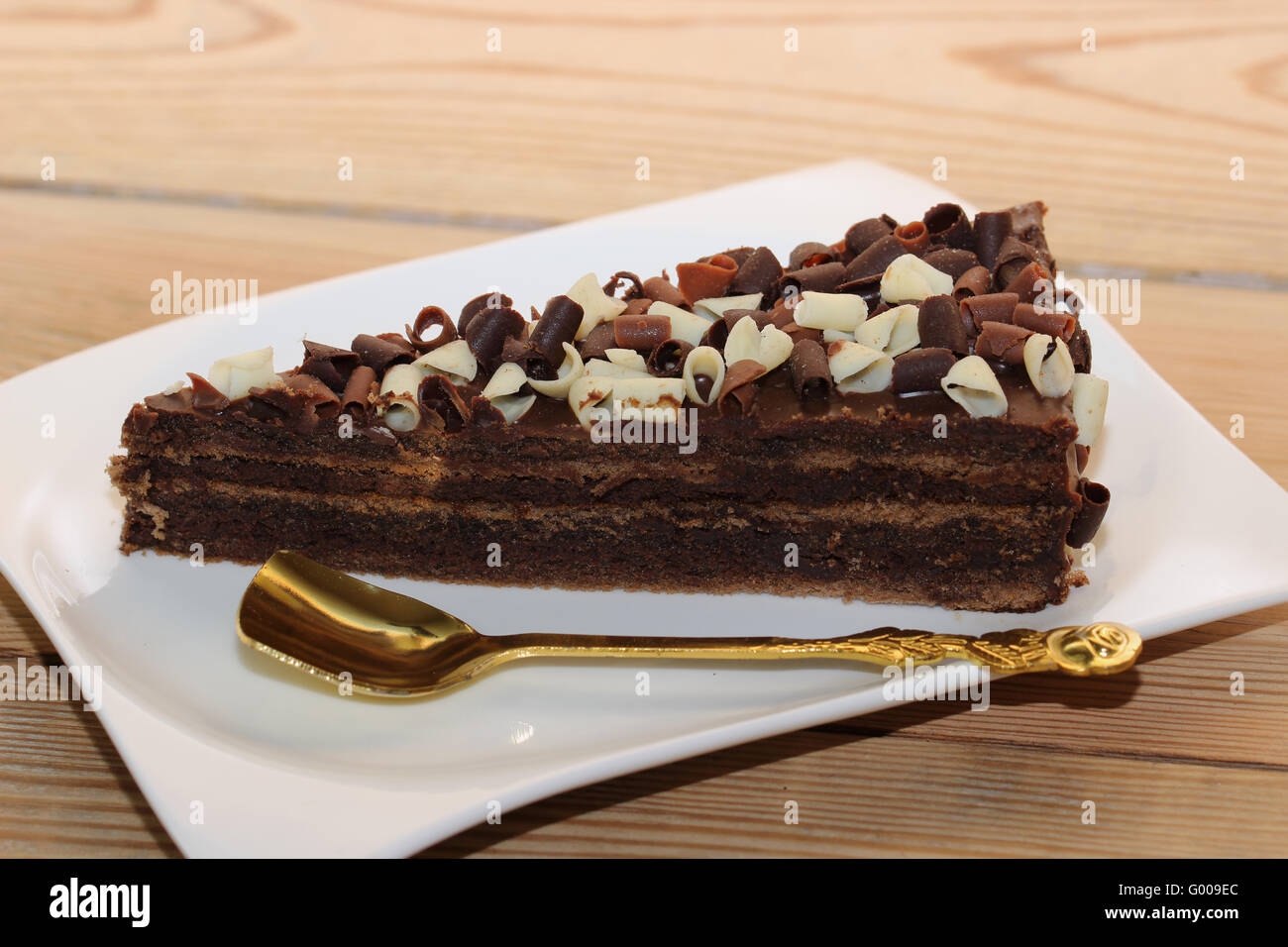 Chocolate cake with spoon Stock Photo