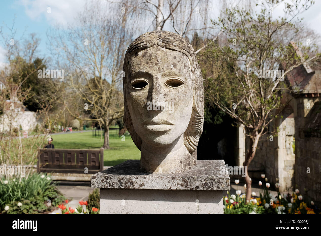 The Janus Head sculpture by John Skelton in the grounds of Southover