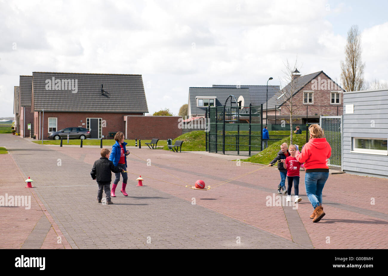 Children play ball in schoolyard hi-res stock photography and images ...